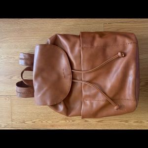 Brown cinch in Backpack